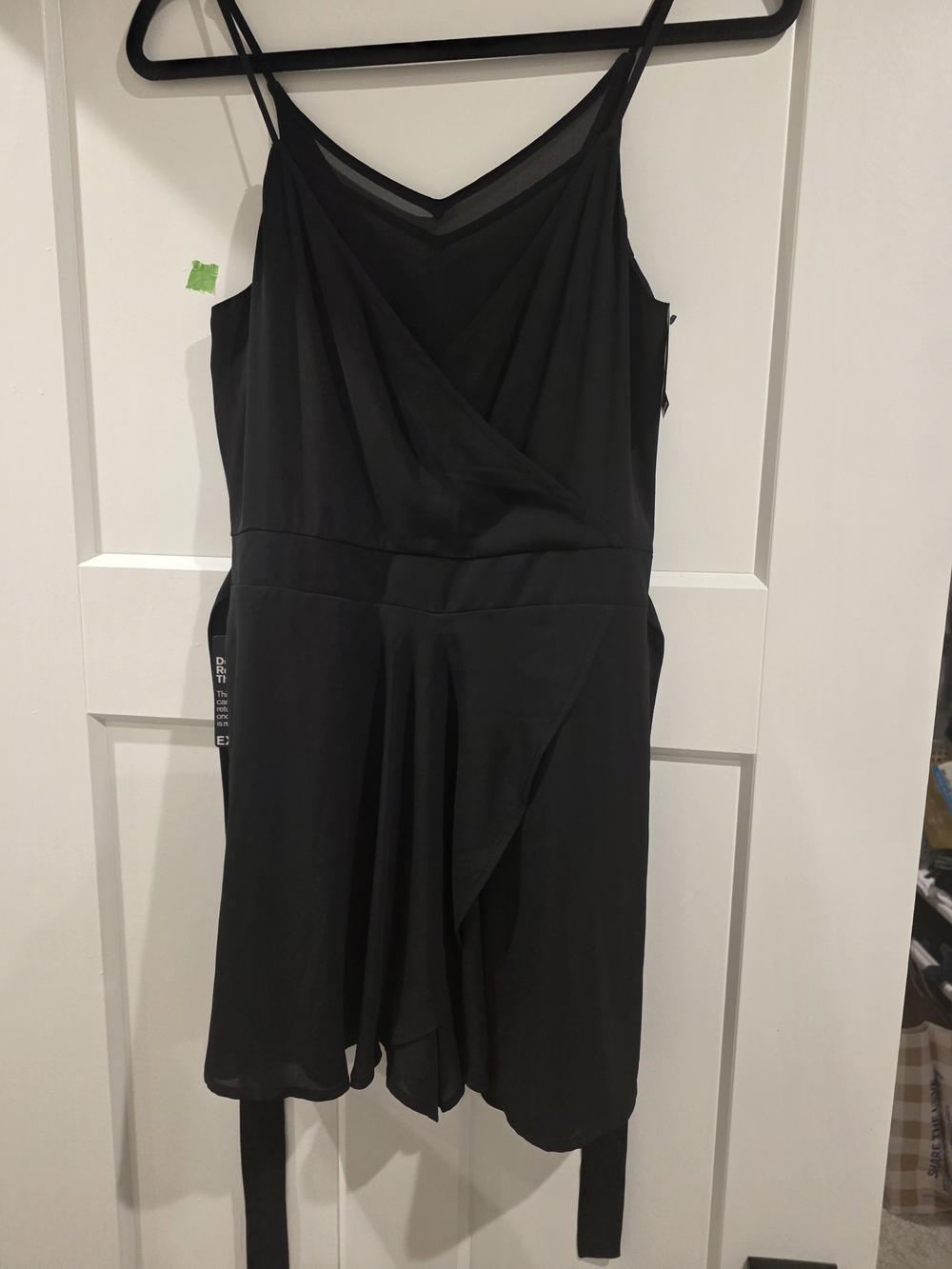 New with tags – Express Black Romper | Size 4